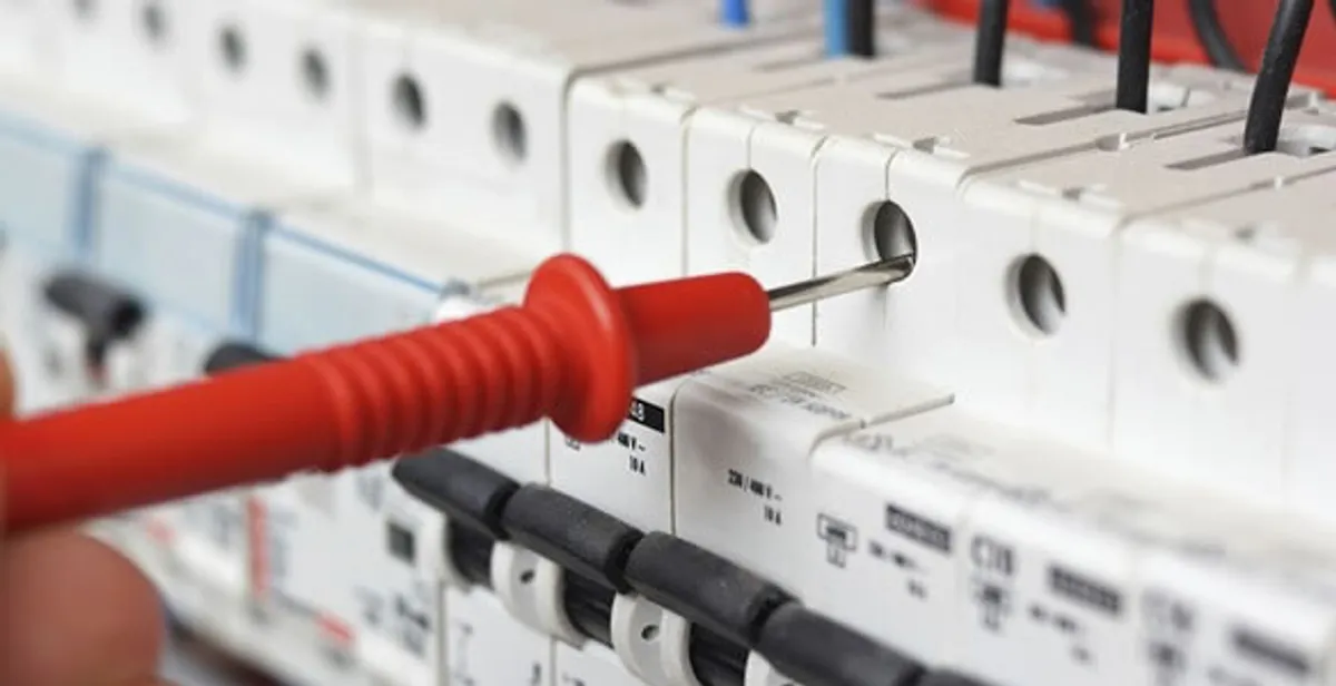 Electrical contractor testing circuit breakers during electrical repair in Salida, CA