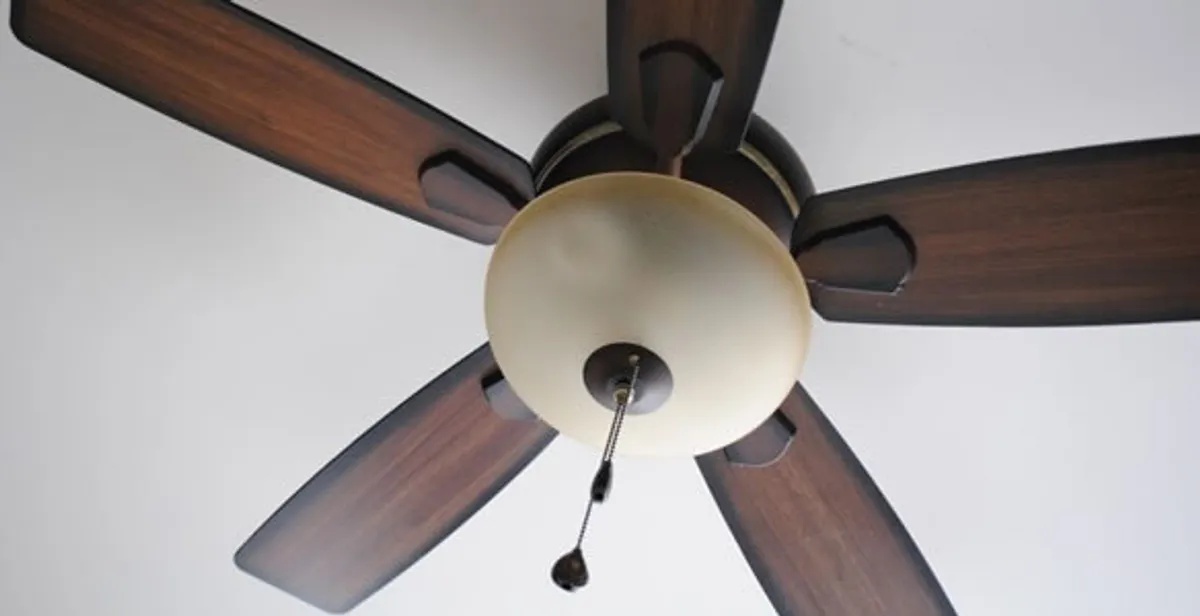 Fully installed ceiling fan with balanced blades and light fixture in Modesto, CA